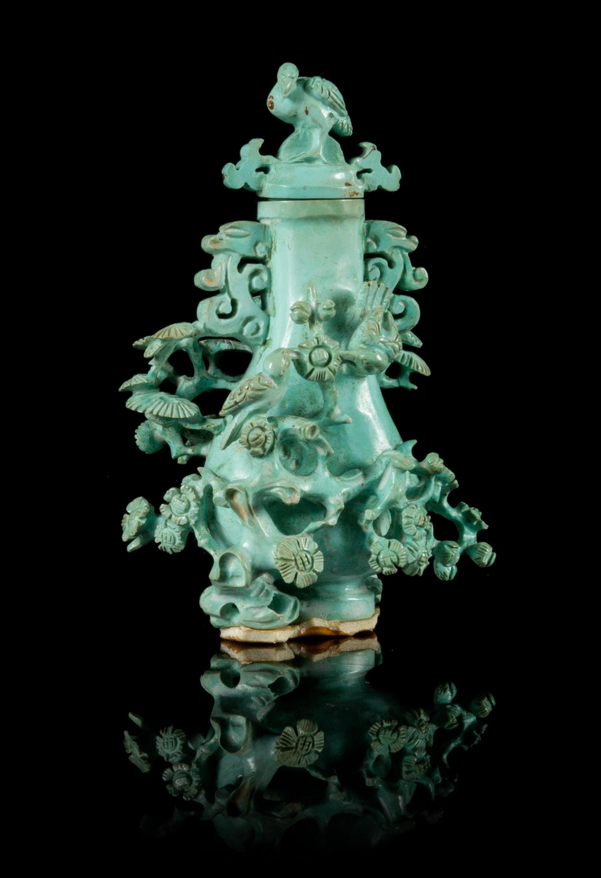 A Carved Turquoise Snuff Bottle Height 3 inches.