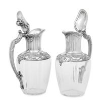 A Pair of French Silver and Glass Claret Jugs