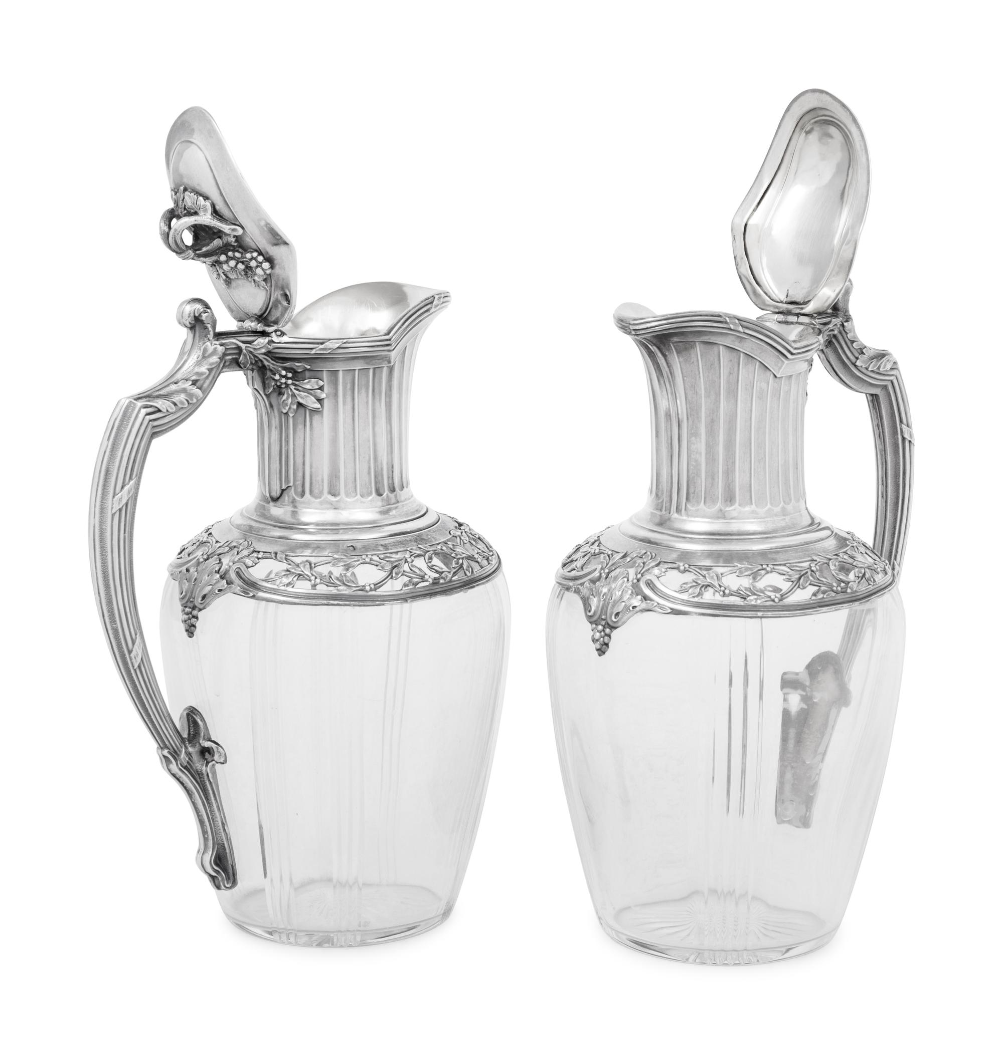 A Pair of French Silver and Glass Claret Jugs