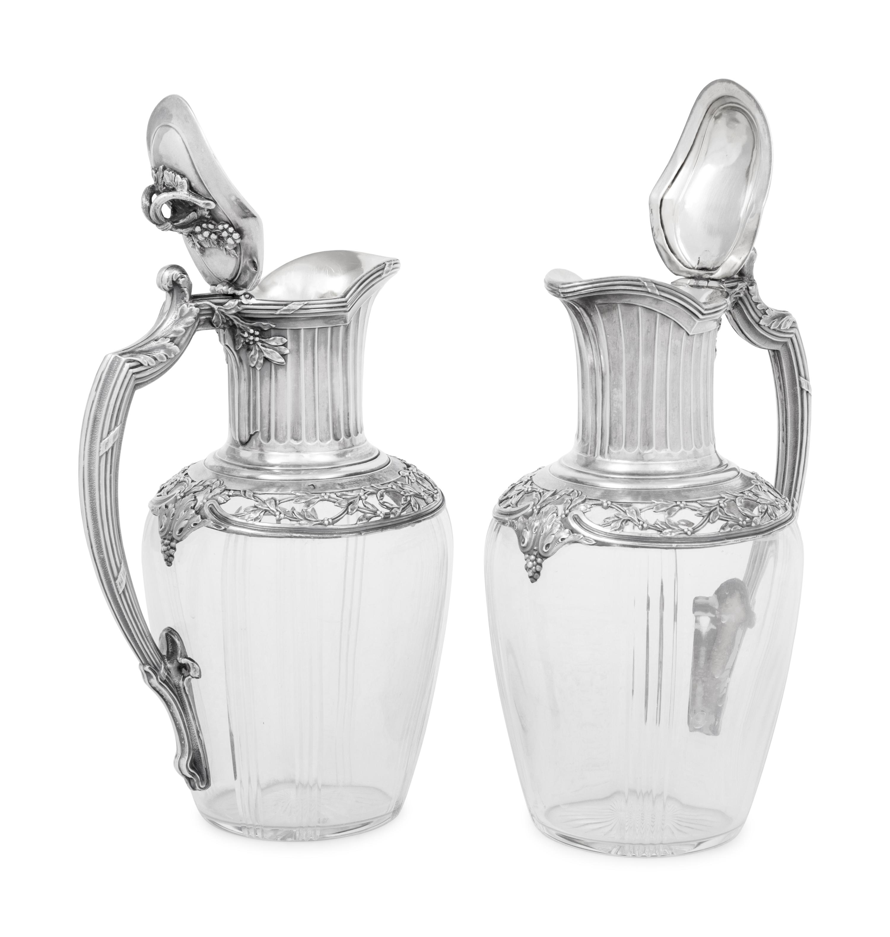 A Pair of French Silver and Glass Claret Jugs