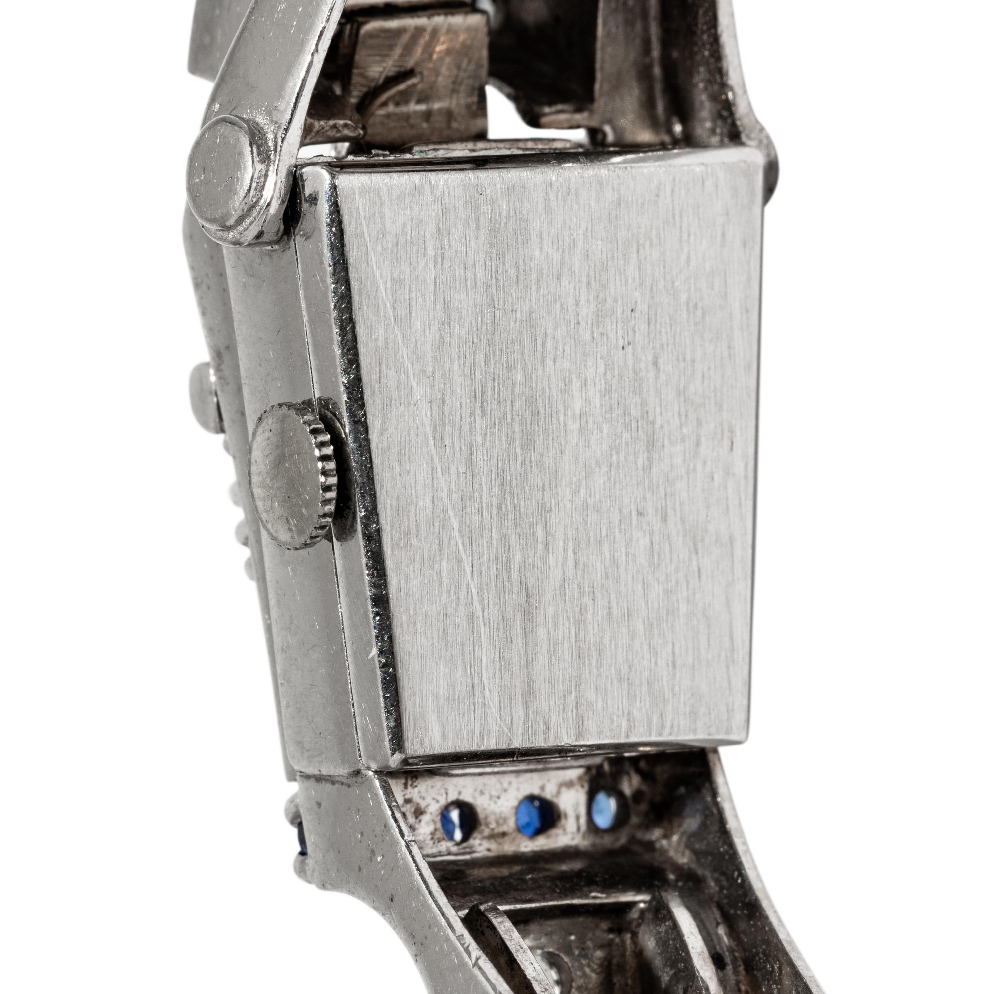 BULOVA, RETRO, WHITE GOLD, DIAMOND, AND SAPPHIRE HIDDEN DIAL WATCH