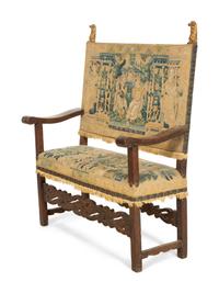 A Jacobean Style Walnut Bench with Tapestry Upholstery