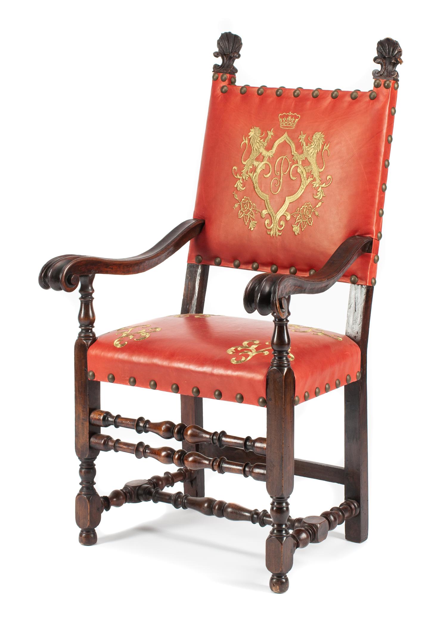 A Spanish Renaissance Style Walnut Armchair Height 51 x width 29 x depth 25 inches.
