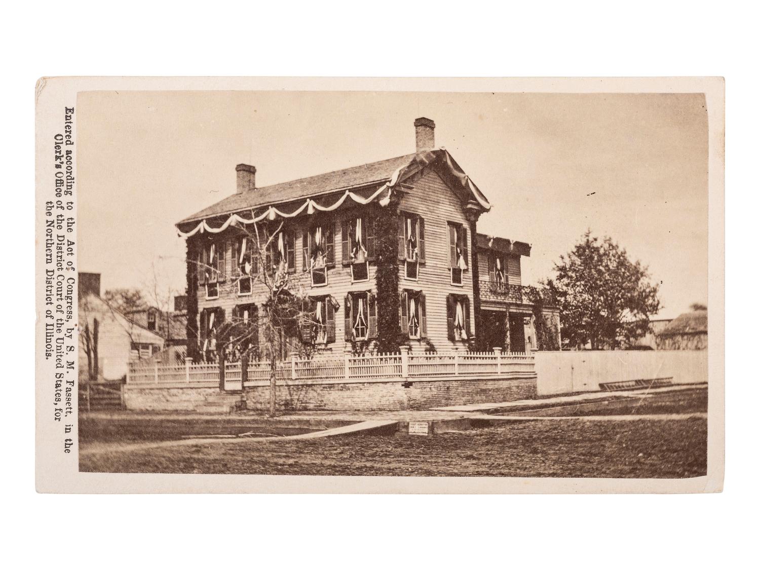[LINCOLN, Abraham (1809-1865)]. CDV of Lincoln's Springfield home draped in mourning. Chicago: S.M. Fassett, ca 1865.