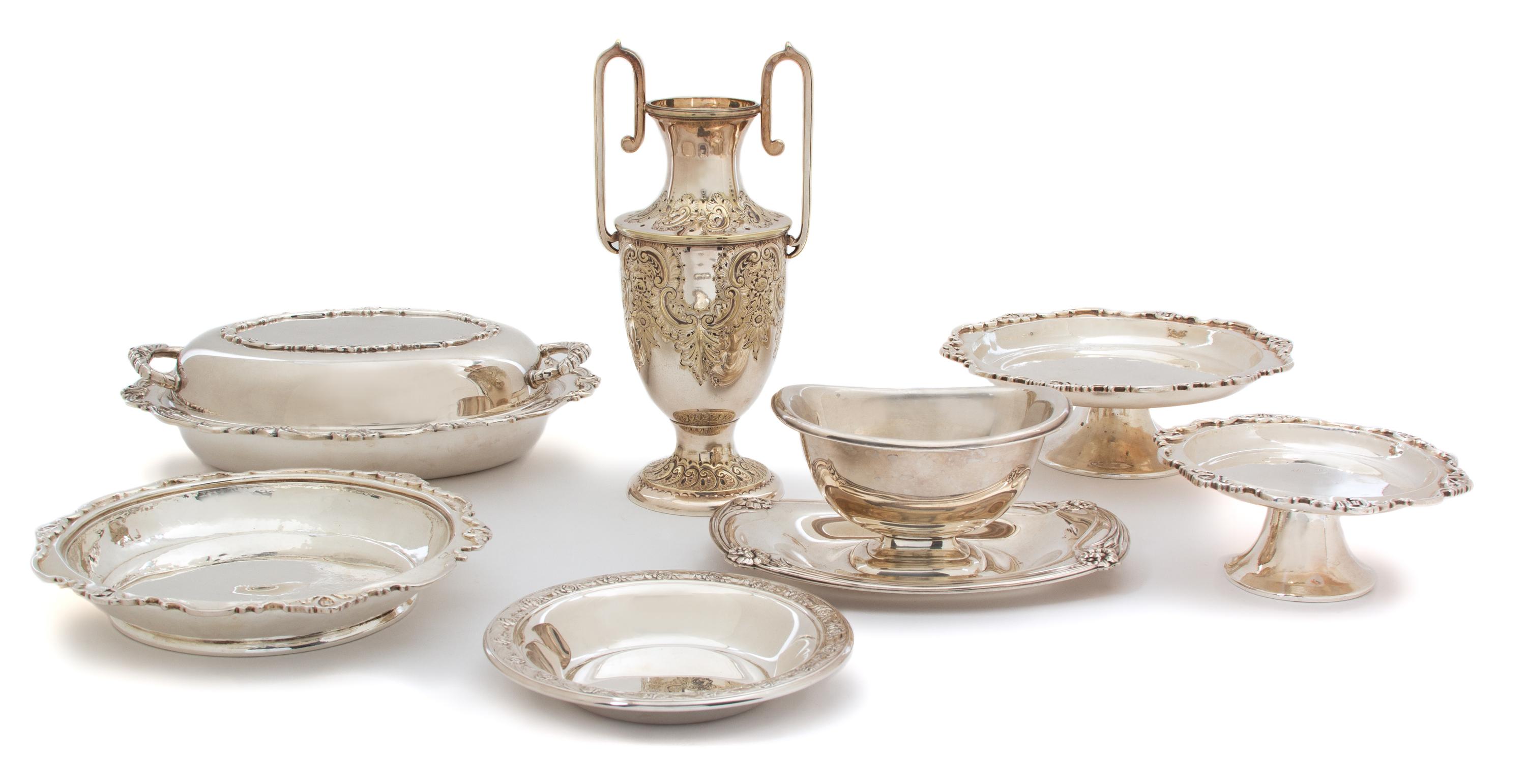 A Group of Seven Miscellaneous Silver Plate Articles Height of urn 10 3/8 inches. — 20TH CENTURY