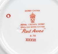A Royal Crown Derby Red Aves Porcelain Dinner Service