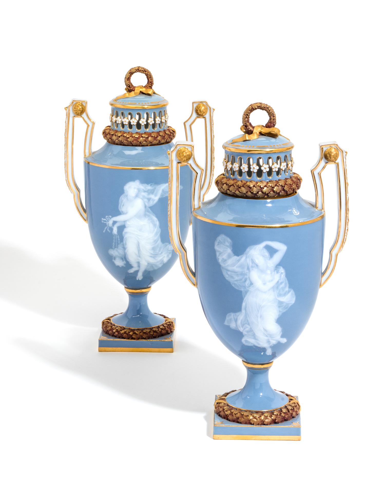 A Pair of Meissen Porcelain Pate-sur-Pate Covered Potpourri Vases Height 12 inches. — 19TH CENTURY