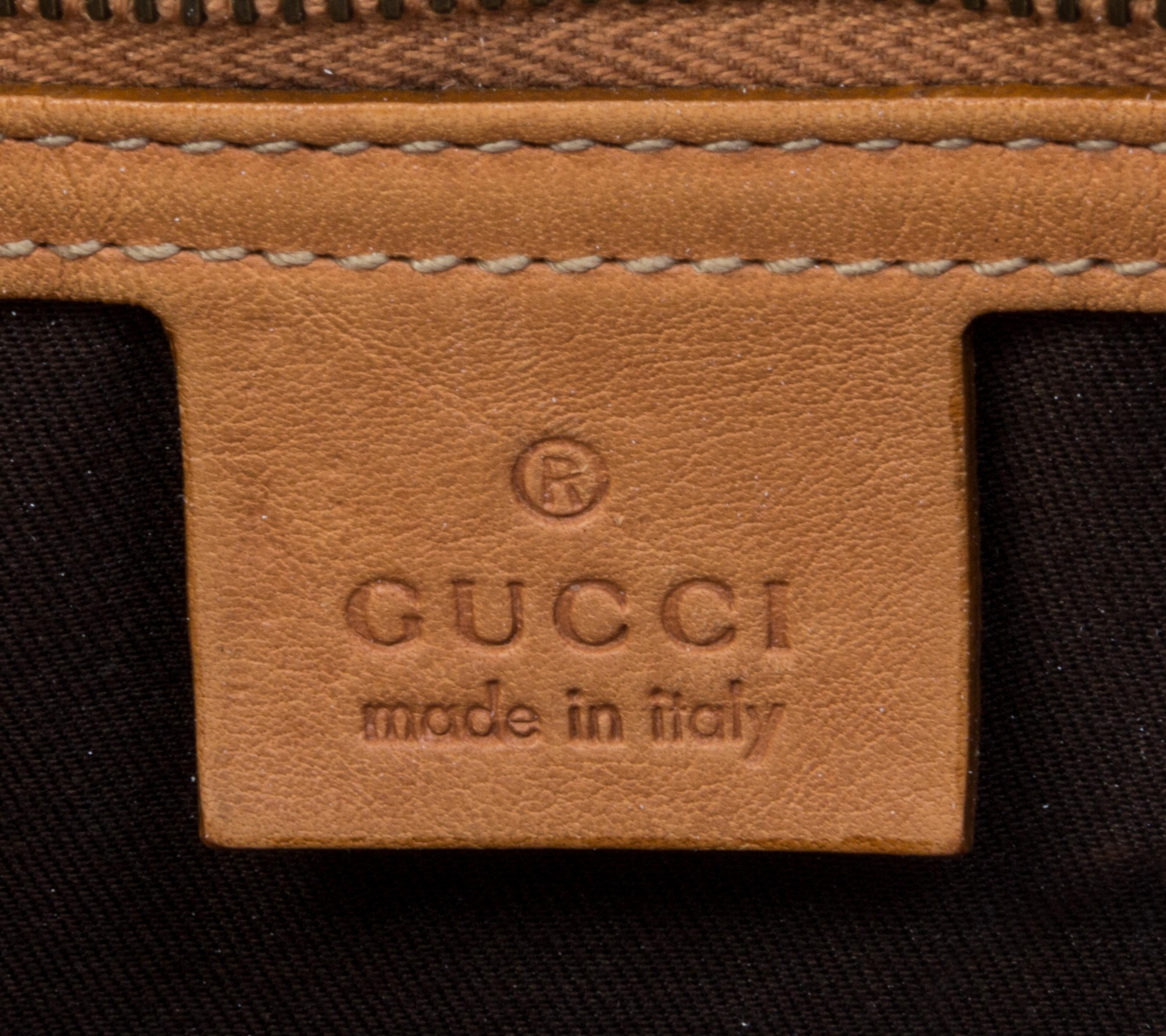 A Gucci Striped Woven Bag, 14" x 12" x 2".