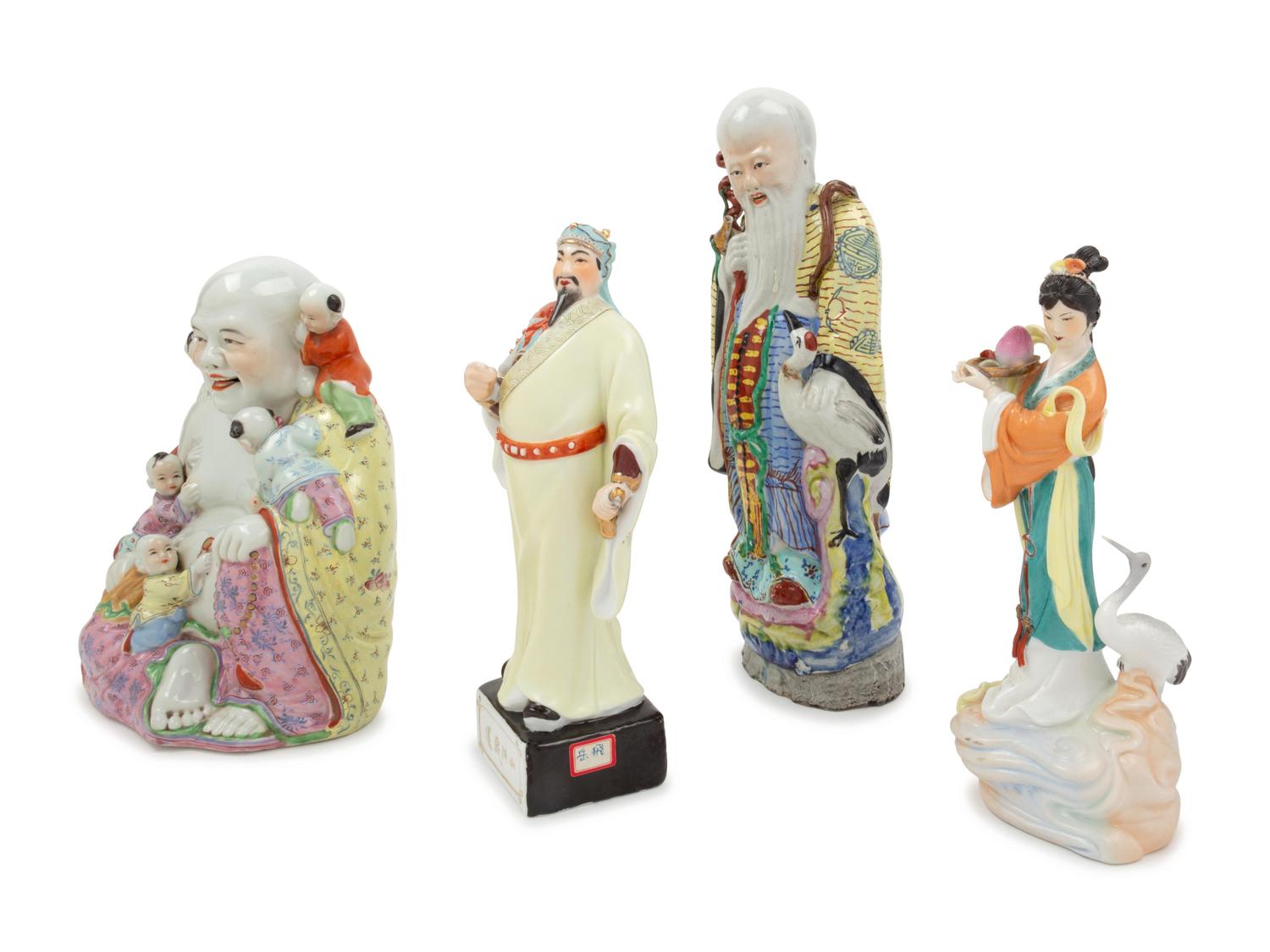 Four Chinese Famille Rose Porcelain Figures