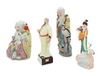 Four Chinese Famille Rose Porcelain Figures