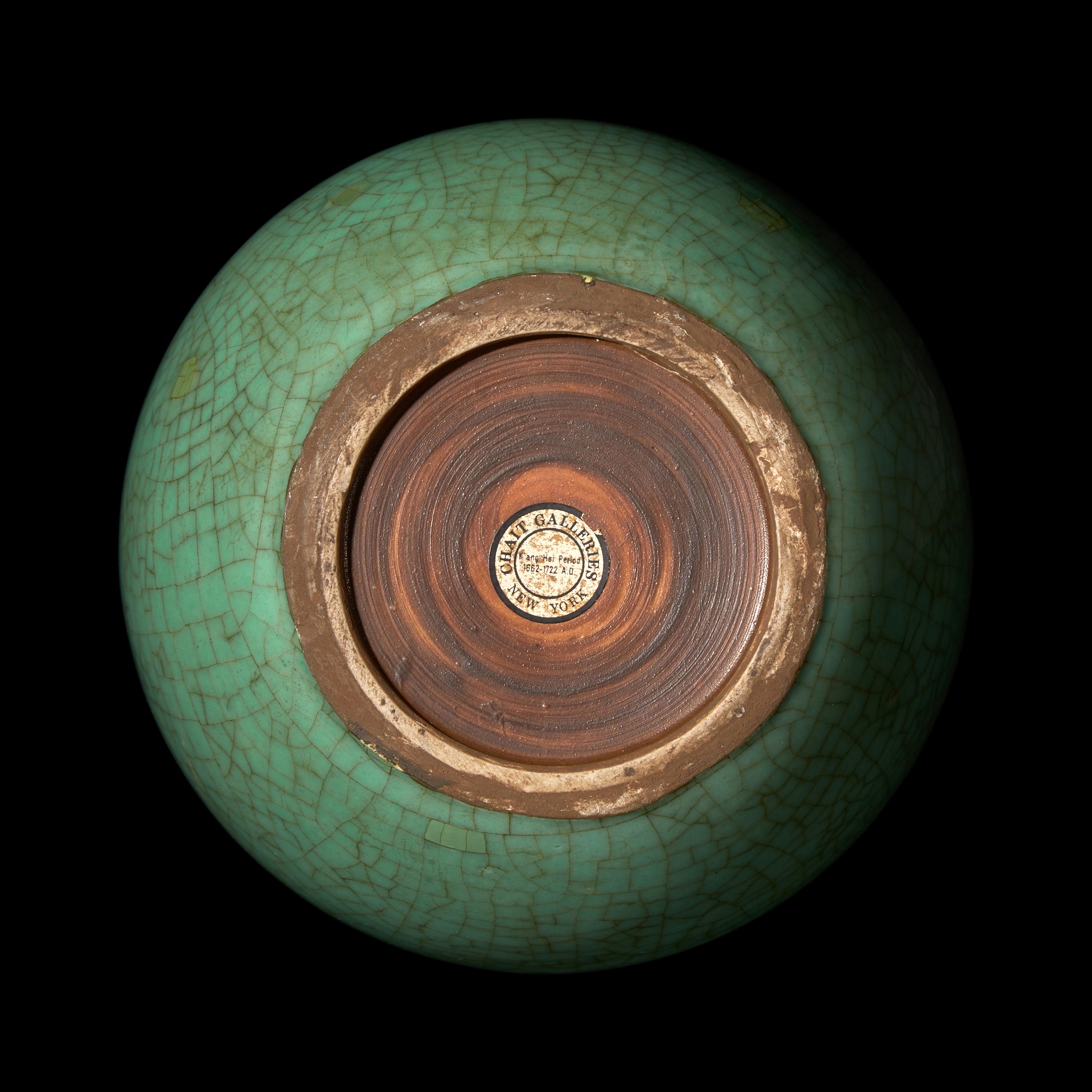 A Chinese Green Glazed Crackled Ground Porcelain Bottle Vase, Tianqiuping, 18th Century 清中期 綠哥釉天球瓶