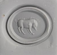 A Roman Red Jasper Ring Stone with a Boar — Set in a gold ring