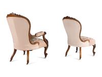 Two Rococo Revival Carved Walnut Chairs