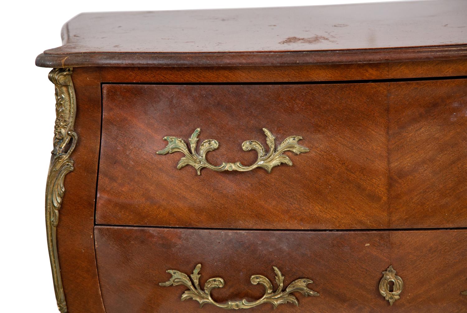 A Pair of Louis XV Style Mahogany Commodes