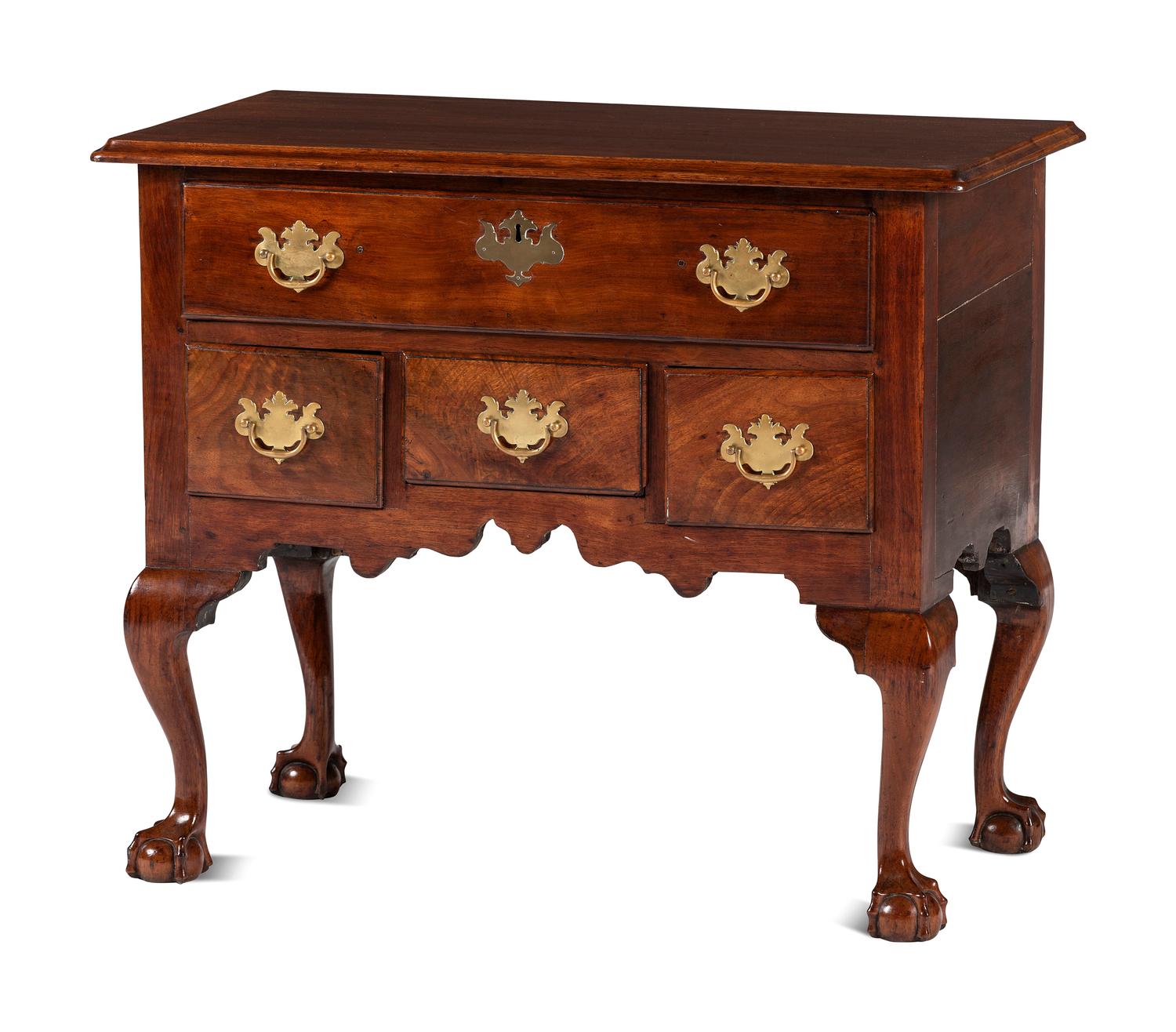 A Chippendale Carved and Figured Walnut Claw-and-Ball Foot Dressing Table