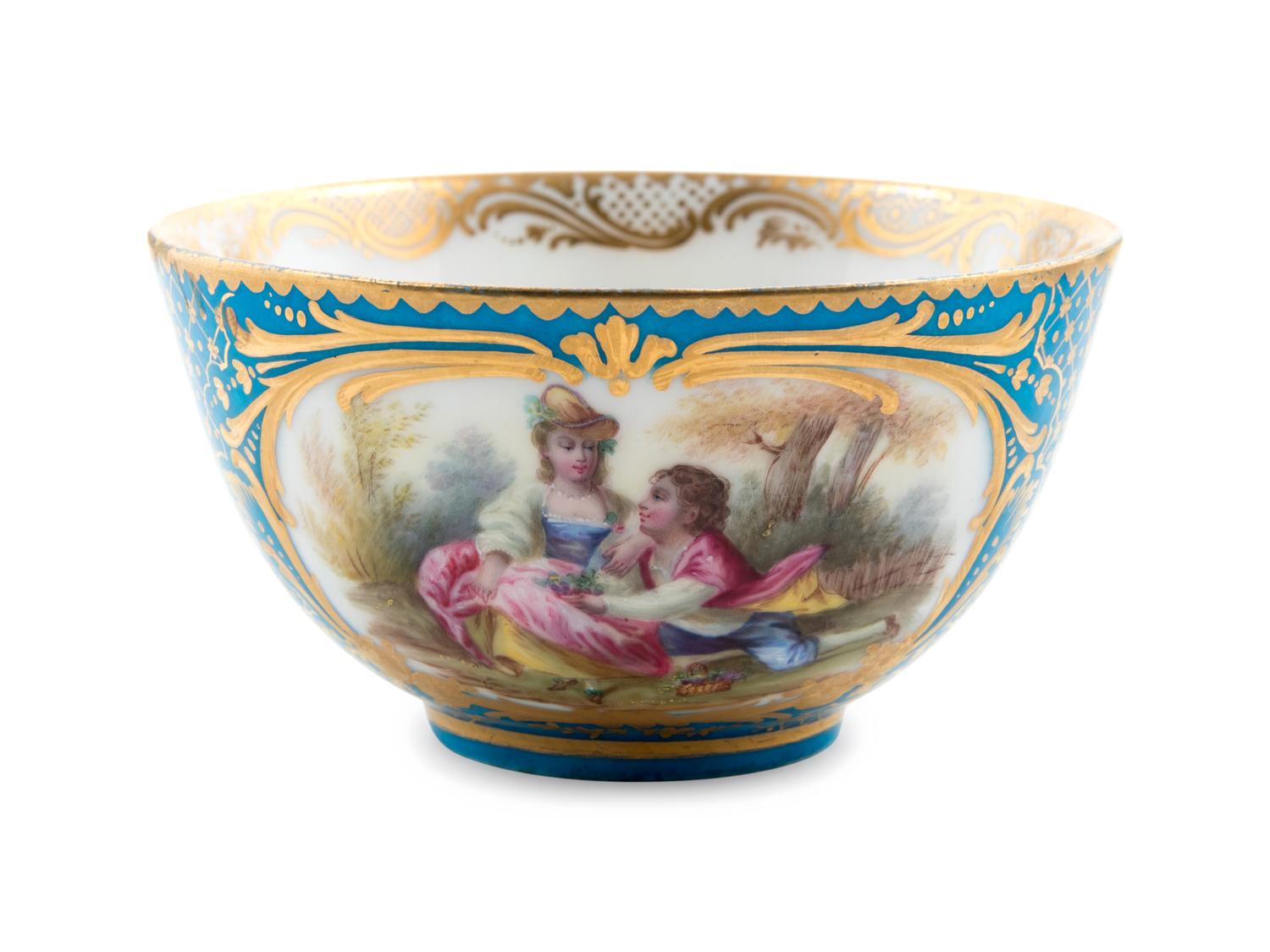 Eight Sèvres Style Painted and Parcel Gilt Porcelain Articles