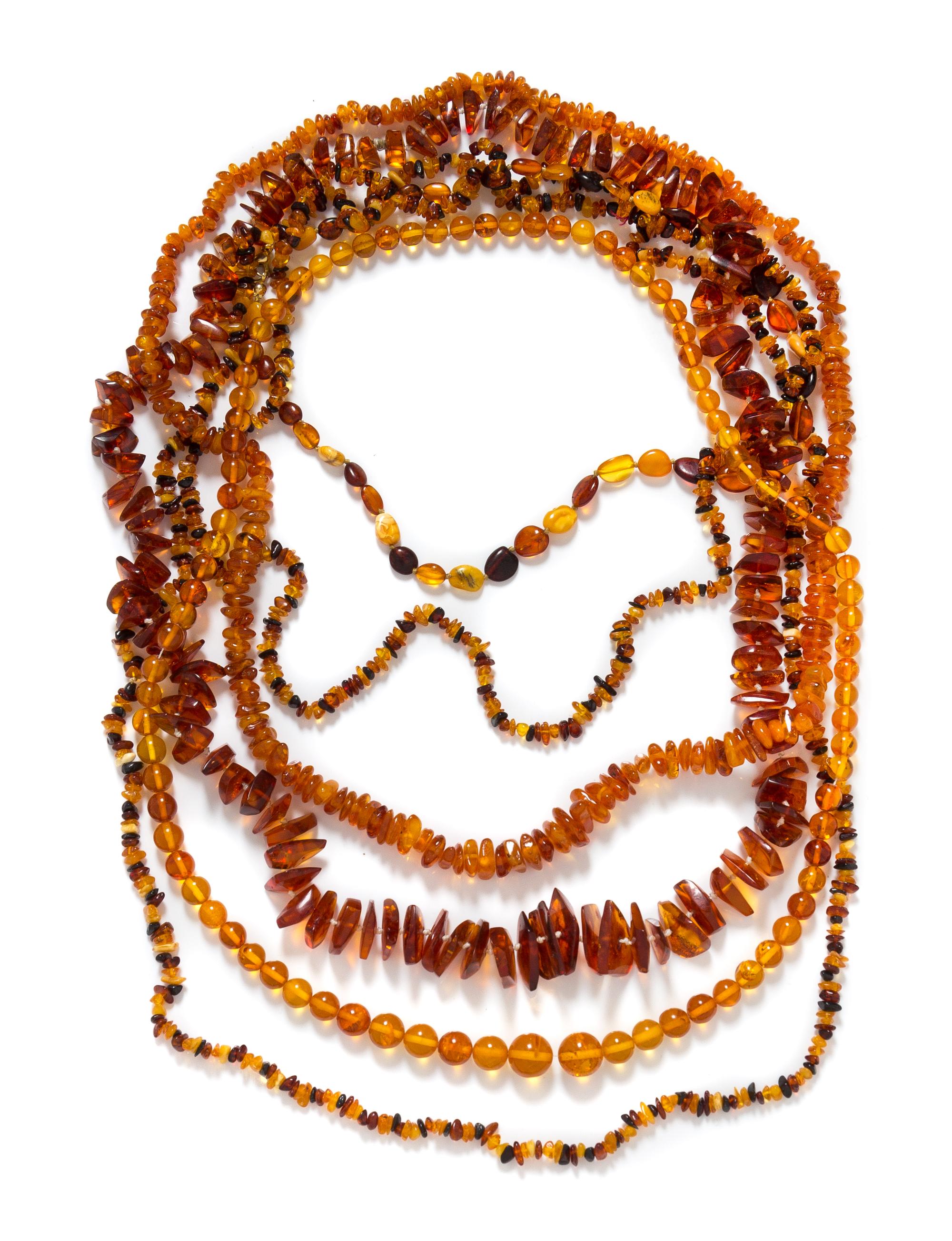 A Collection of Amber Bead Necklaces,