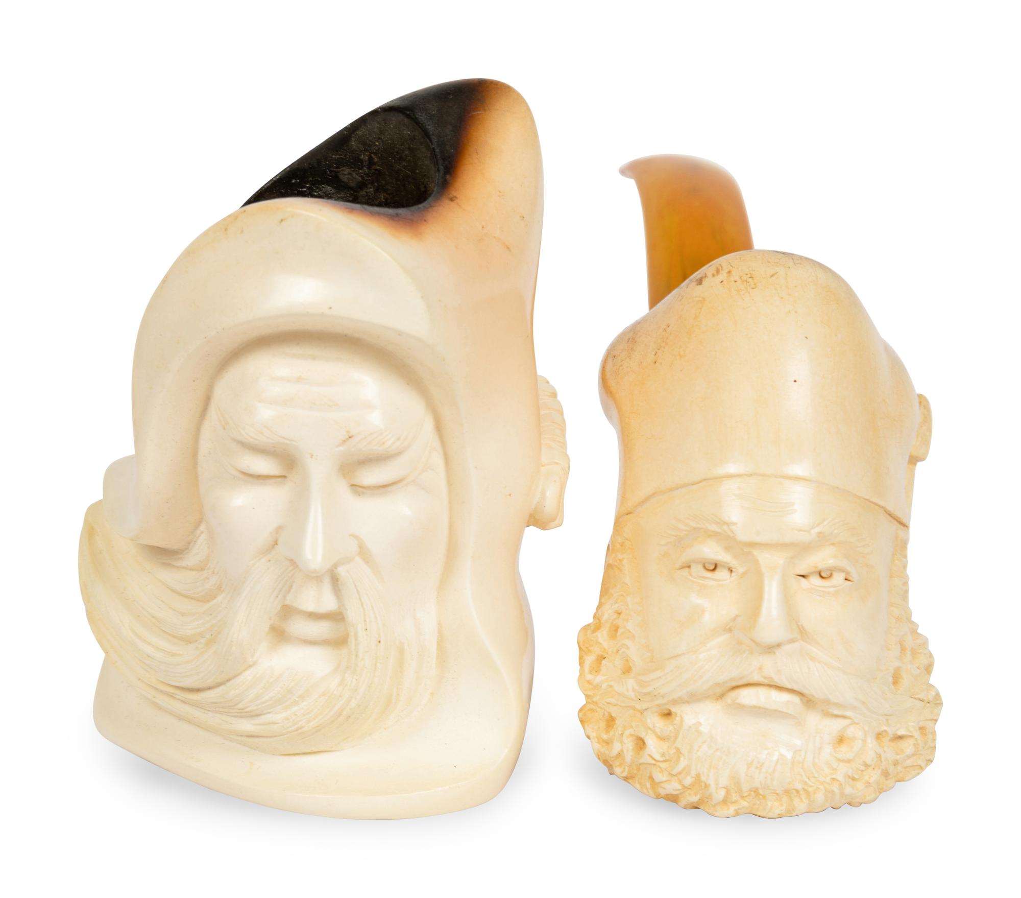 A Group of Seven Carved Meerschaum Pipes