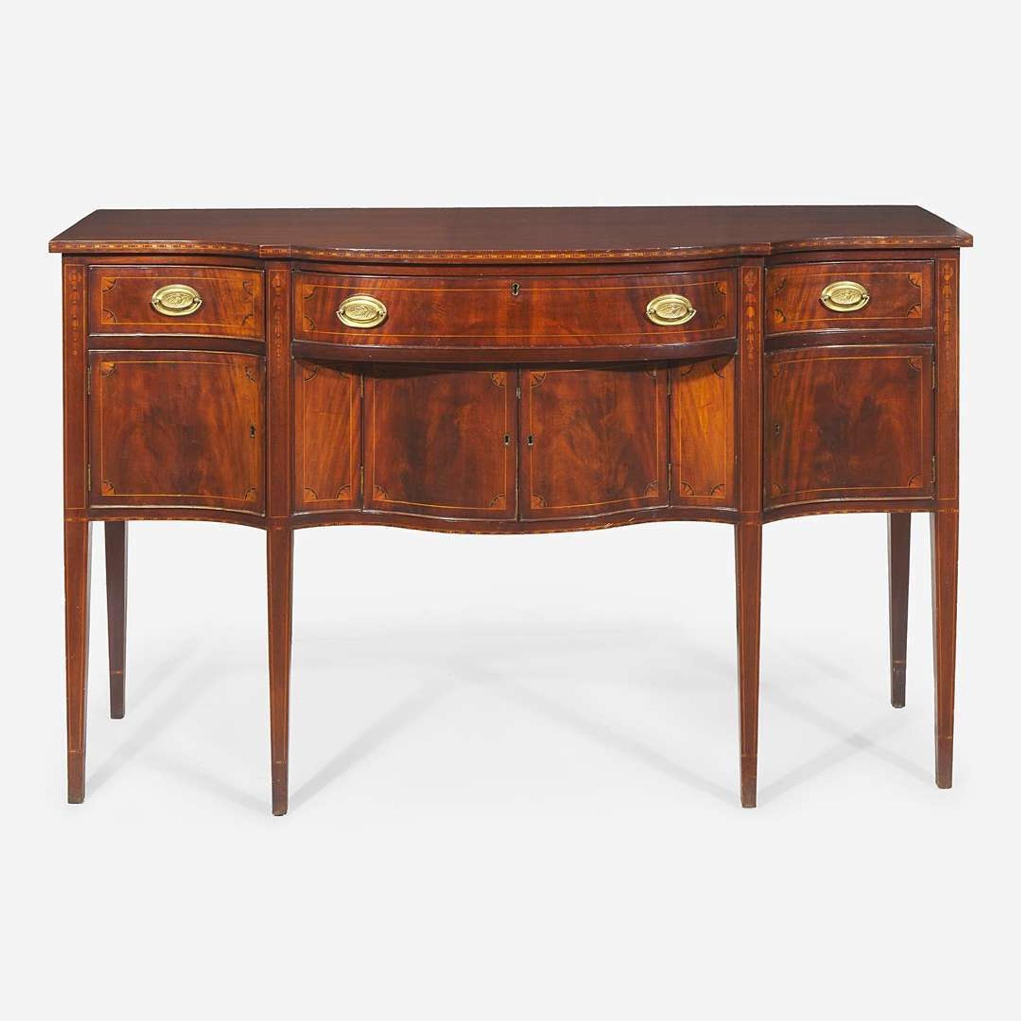 A Federal style inlaid mahogany sideboard