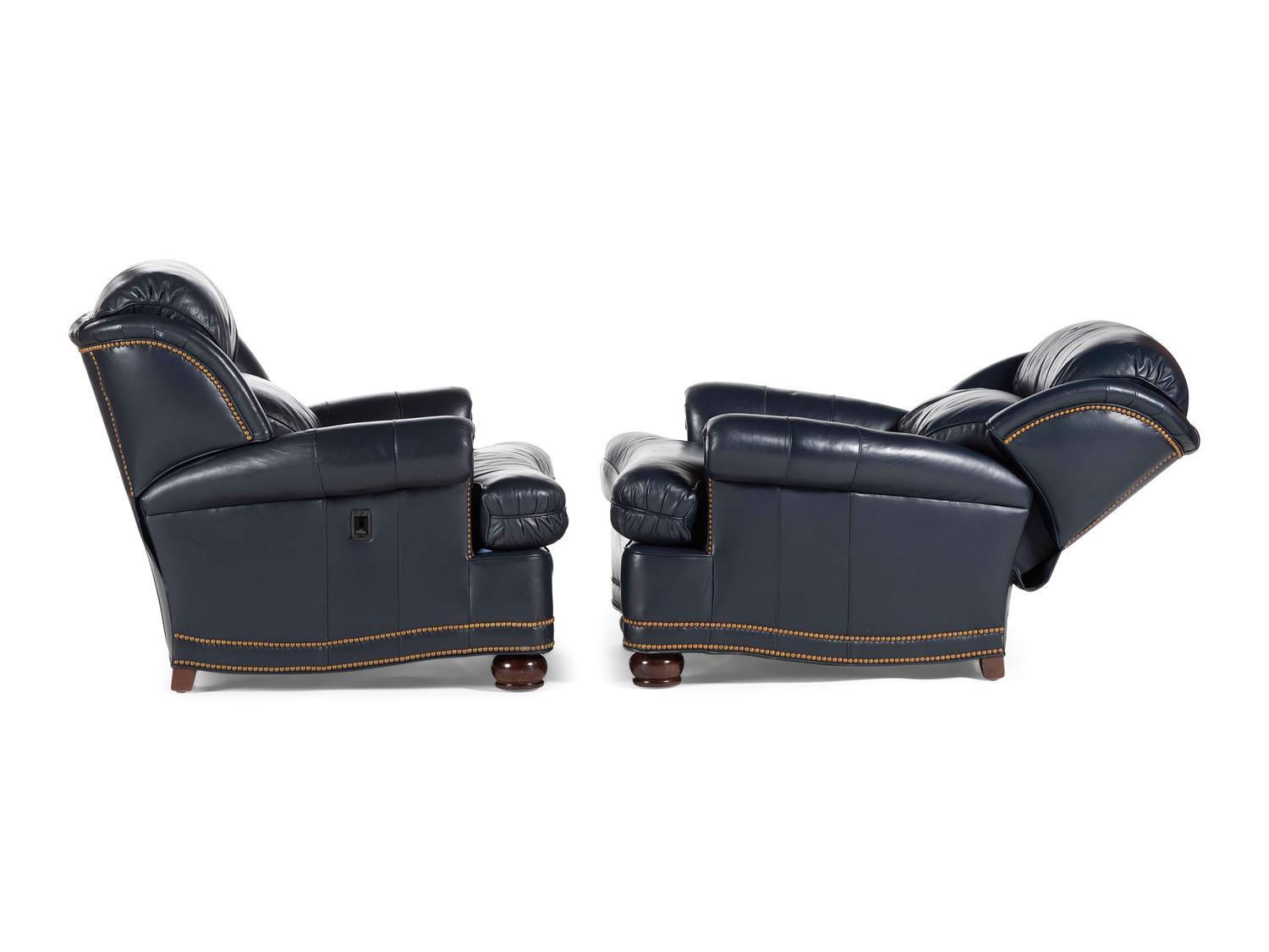 A Pair of Hancock and Moore Brass-Tacked Leather Chairs