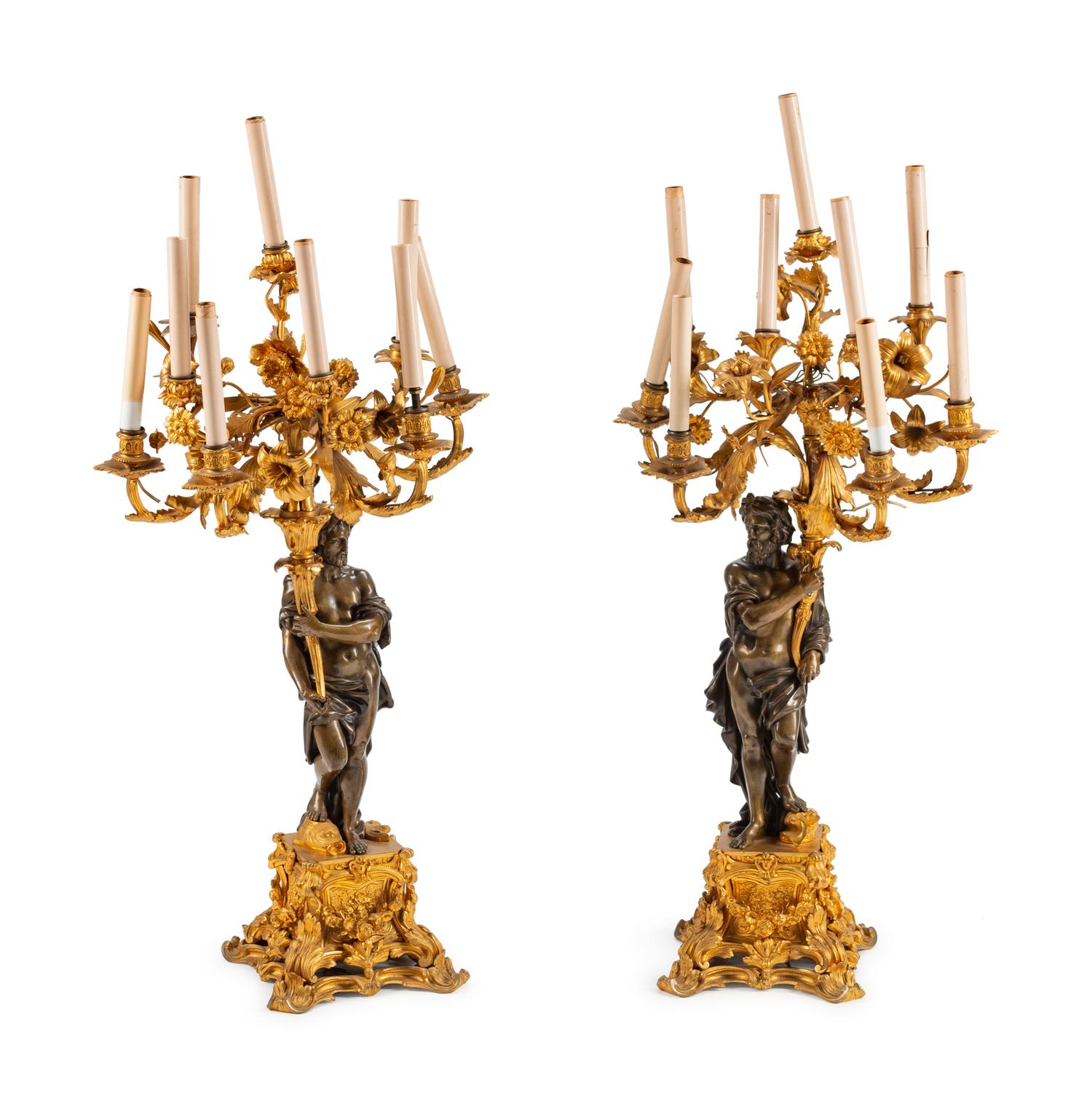 A Pair of Parcel-Gilt and Patinated Bronze Figural Eight-Light Candelabra — 19TH CENTURY