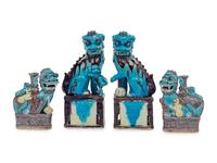 Two Pairs of Chinese Turquoise, Yellow and Purple Glazed Porcelain Figures of Fu Lions