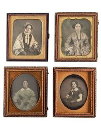 [EARLY PHOTOGRAPHY]. A group of 24 daguerreotypes of lovely young women, including: