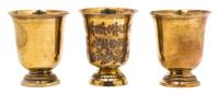 A Set of Three French Fine Vermeil Silver Beakers, Circa 1880, one having etched foliate decoration.