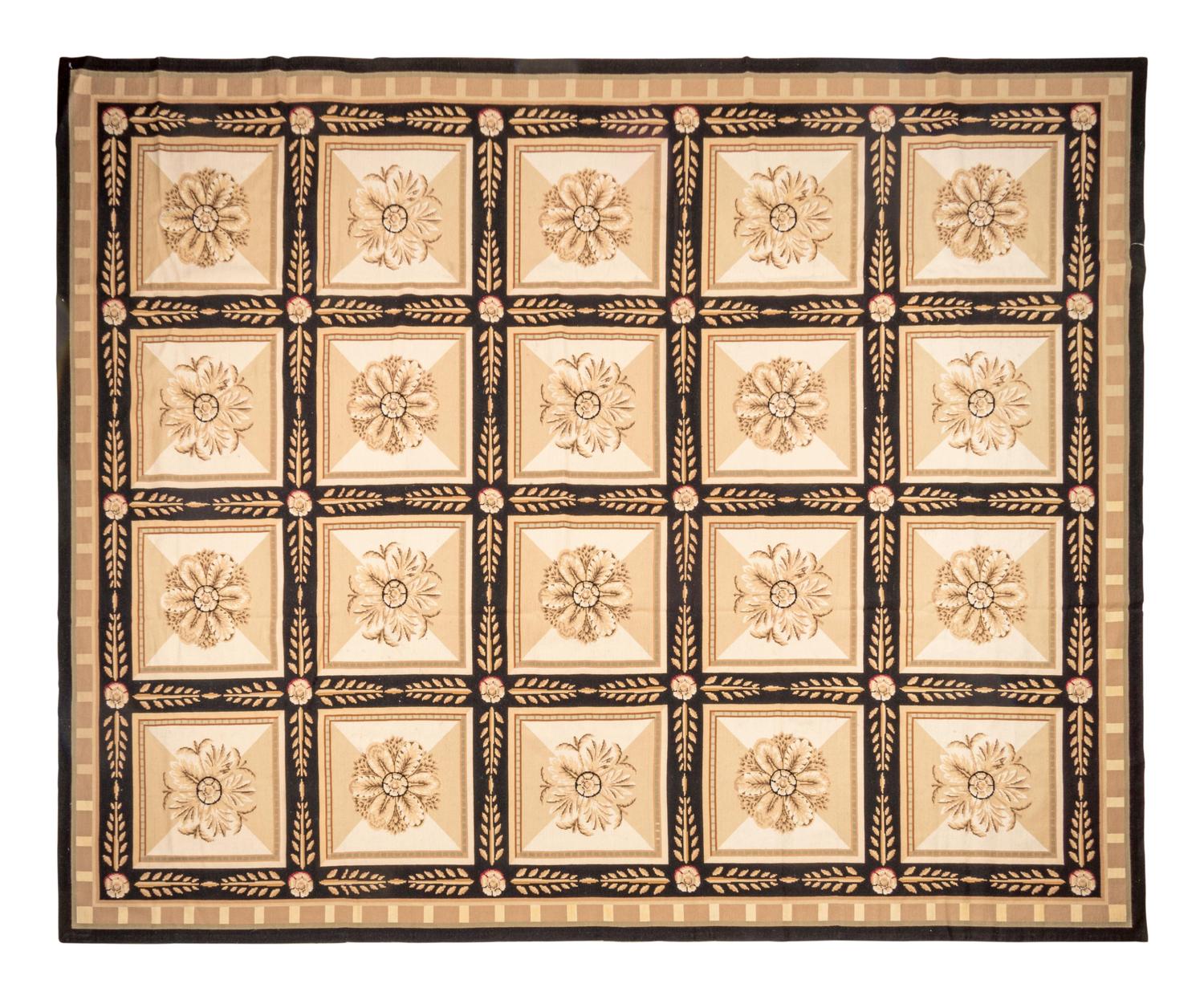 A Continental Needlepoint Rug