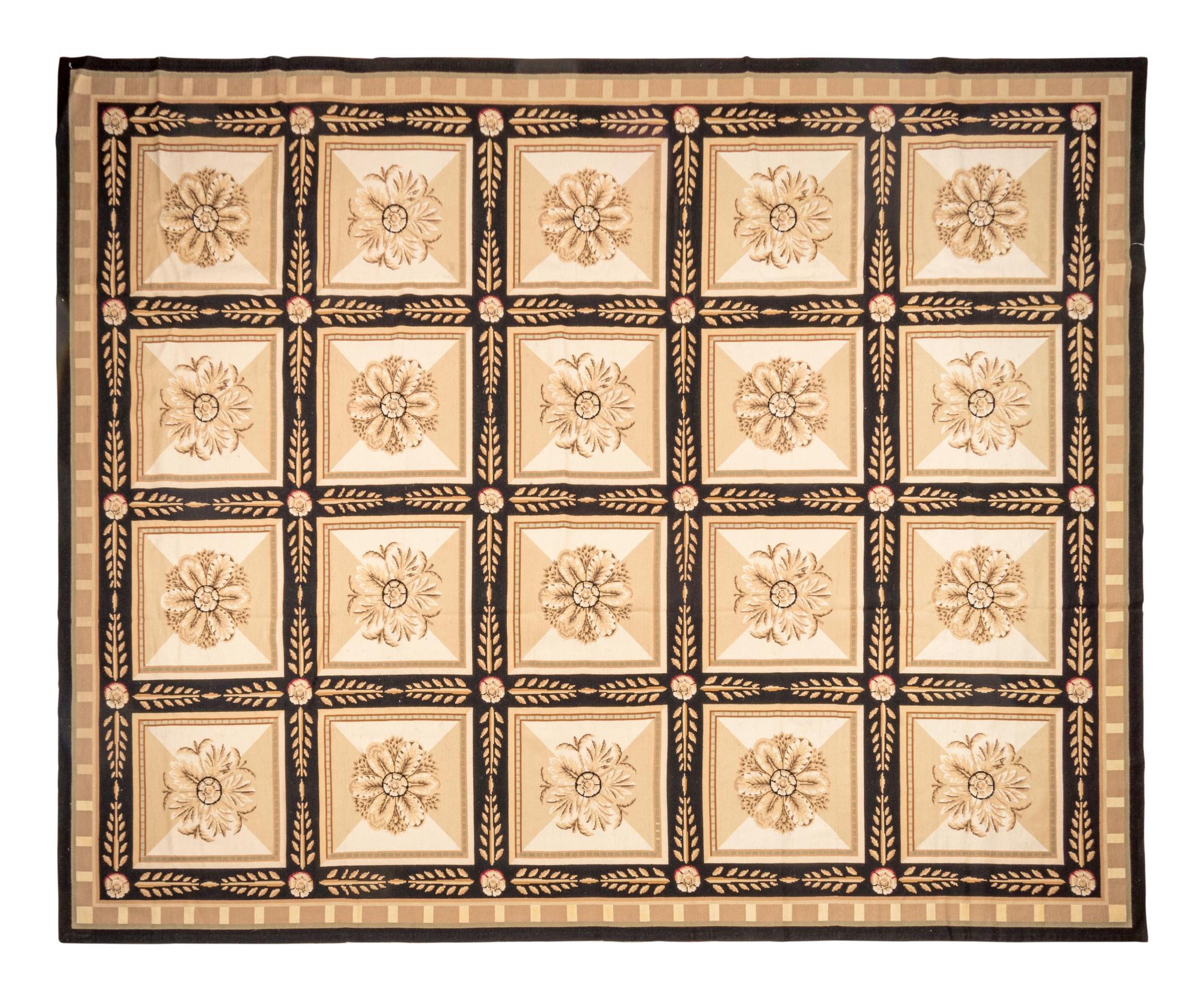 A Continental Needlepoint Rug