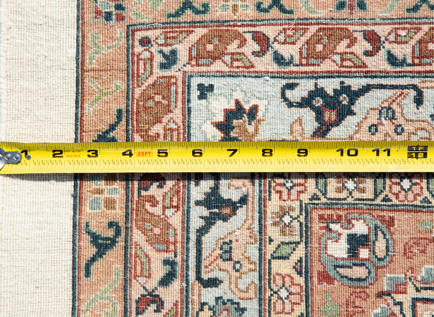 A Tabriz Wool Rug