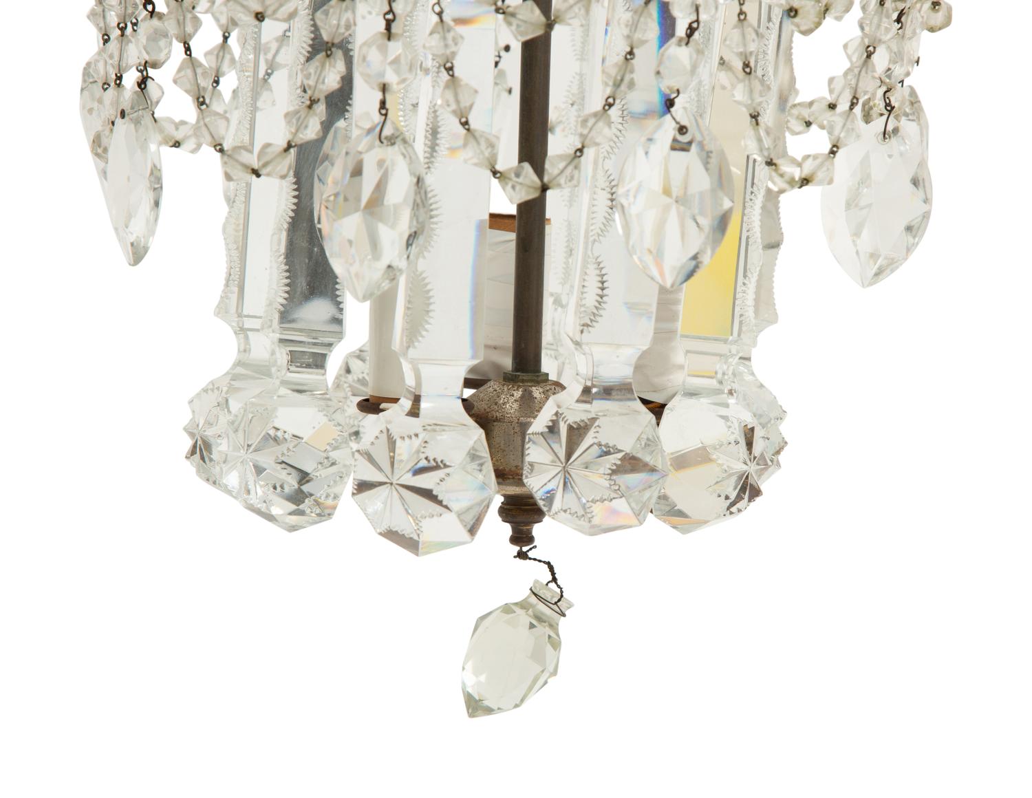 A French Gilt Metal and Cut Glass Three-Light Chandelier