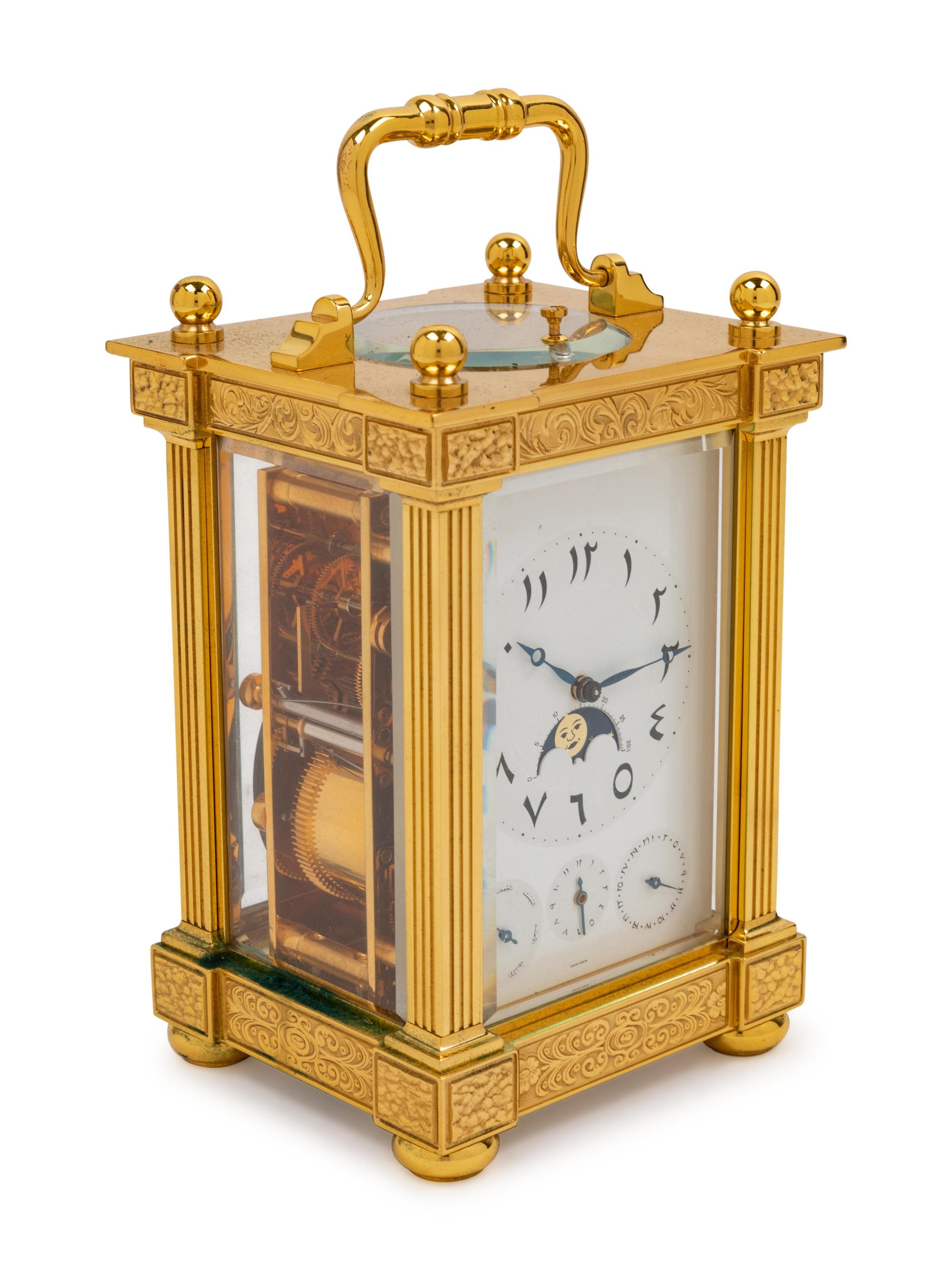A Swiss Gilt Brass Carriage Clock
