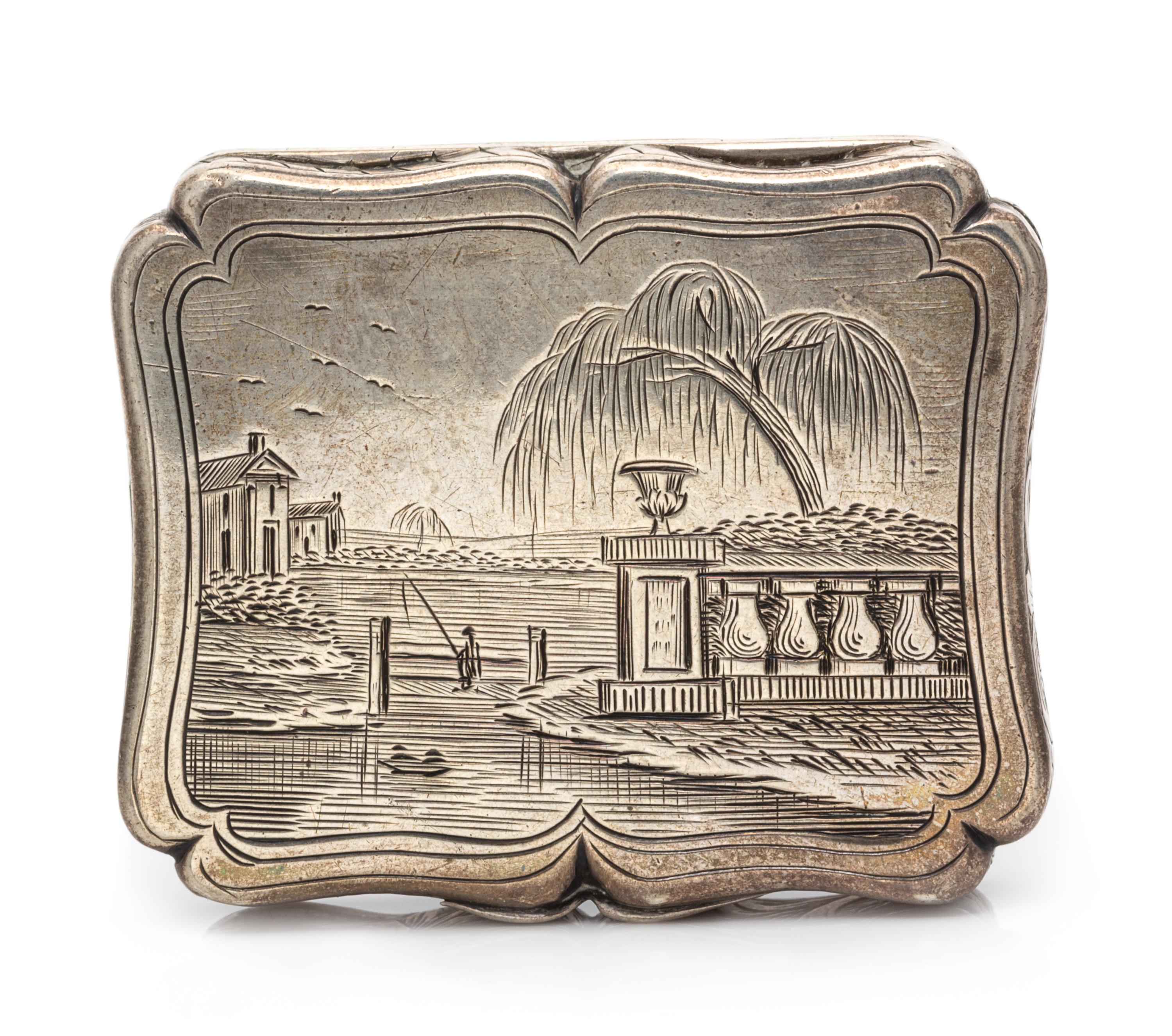 A Victorian Silver Vinaigrette, Edward Smith, Birmingham, 1844, the lid decorated with a pastoral scene, the case with floral and folia