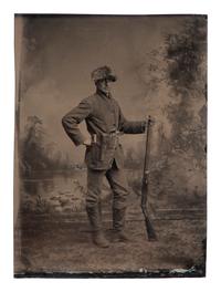 [WESTERN AMERICANA]. 3 tintypes of armed subjects, highlighted by possible buffalo hunter.