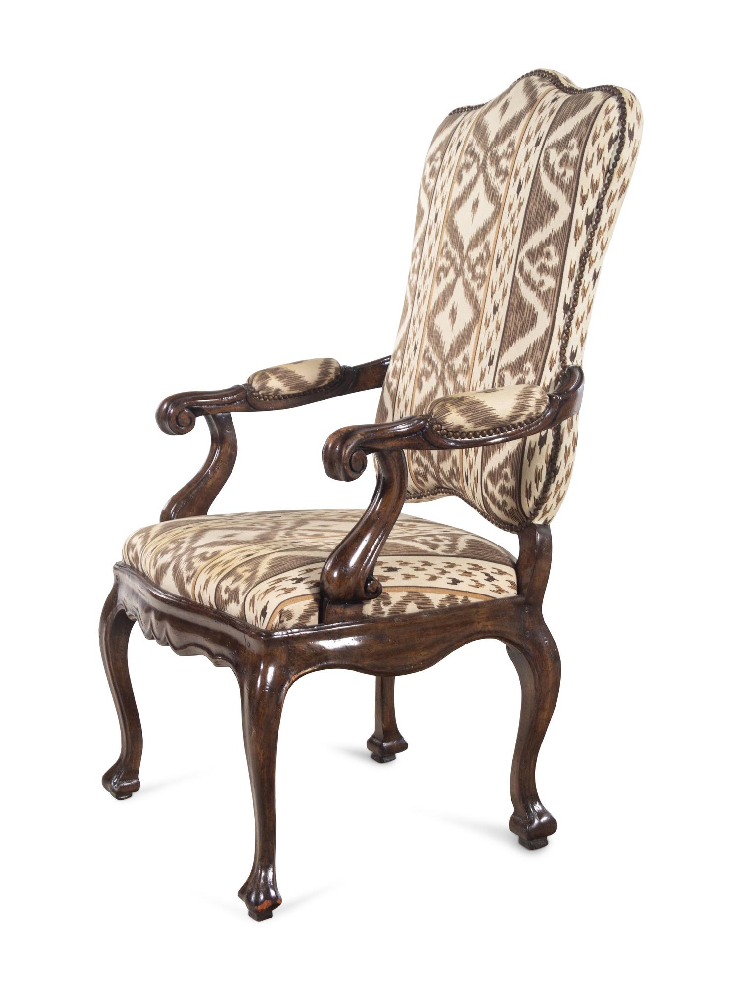 A Set of Eight Italian Baroque Style Fruitwood Dining Chairs