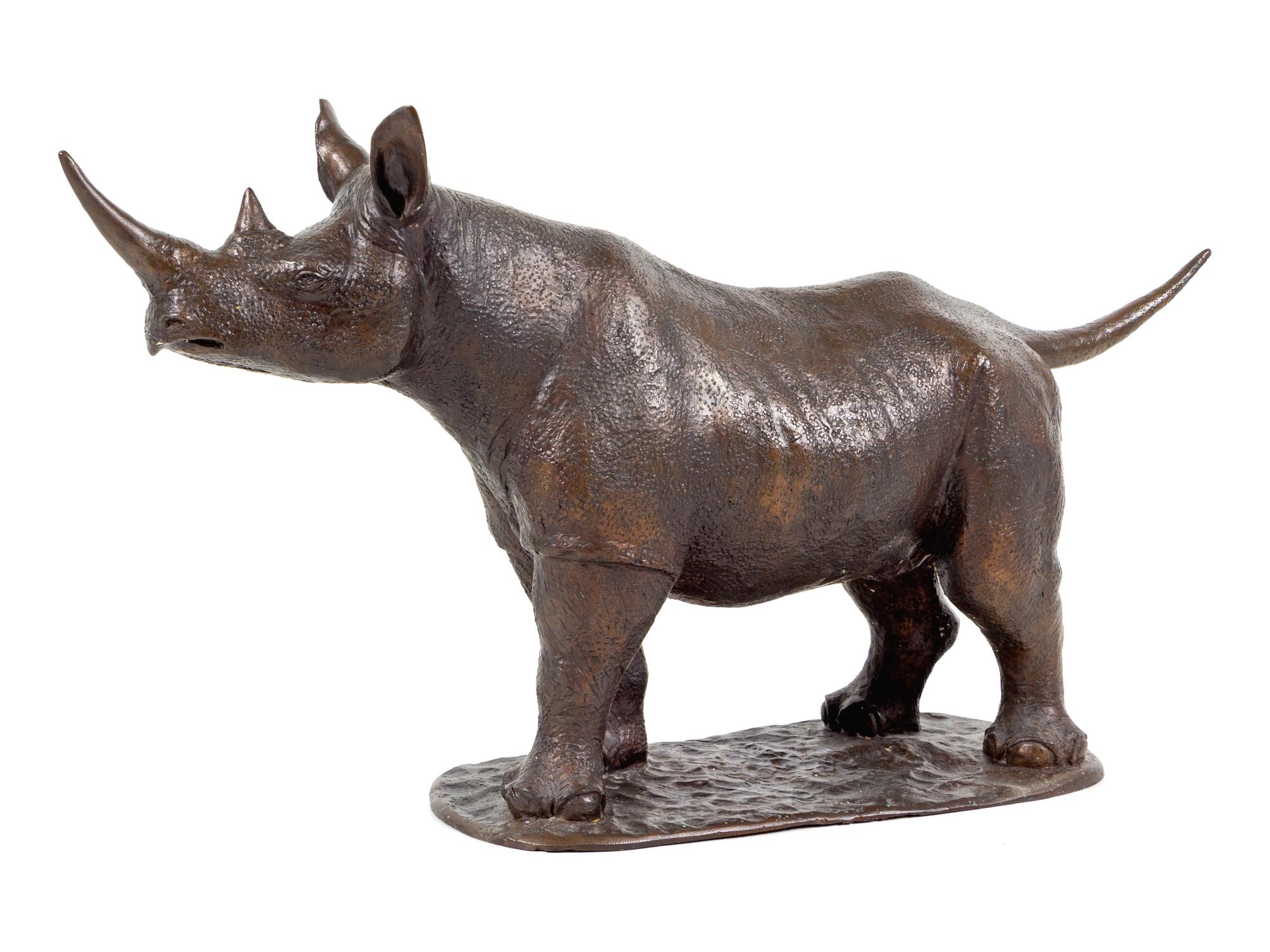 A Cast Metal Figure of a Rhinoceros