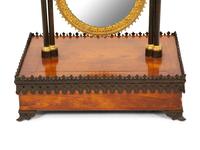 A Charles X Gothic-Motif Patinated, Gilt Bronze and Satinwood Dressing Mirror
