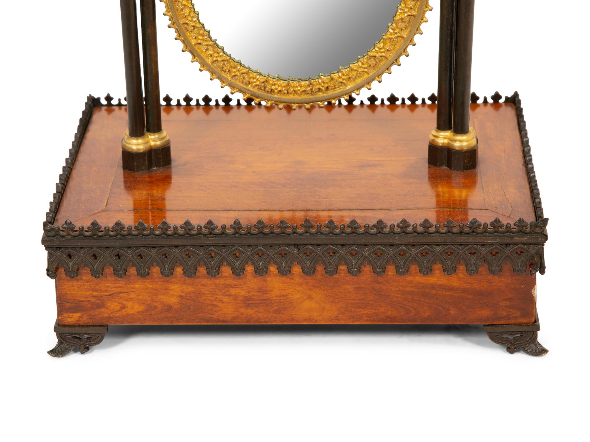 A Charles X Gothic-Motif Patinated, Gilt Bronze and Satinwood Dressing Mirror