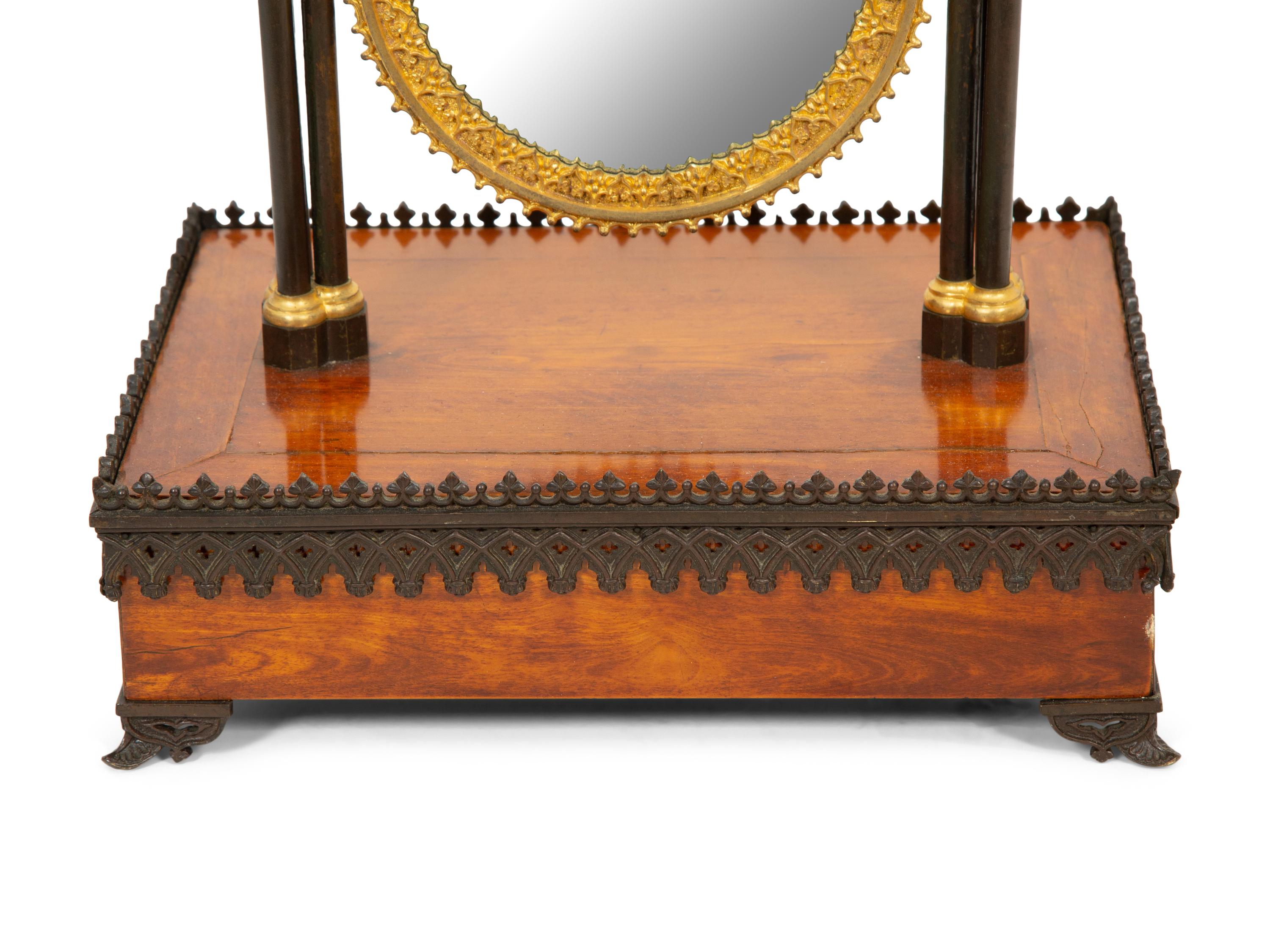 A Charles X Gothic-Motif Patinated, Gilt Bronze and Satinwood Dressing Mirror