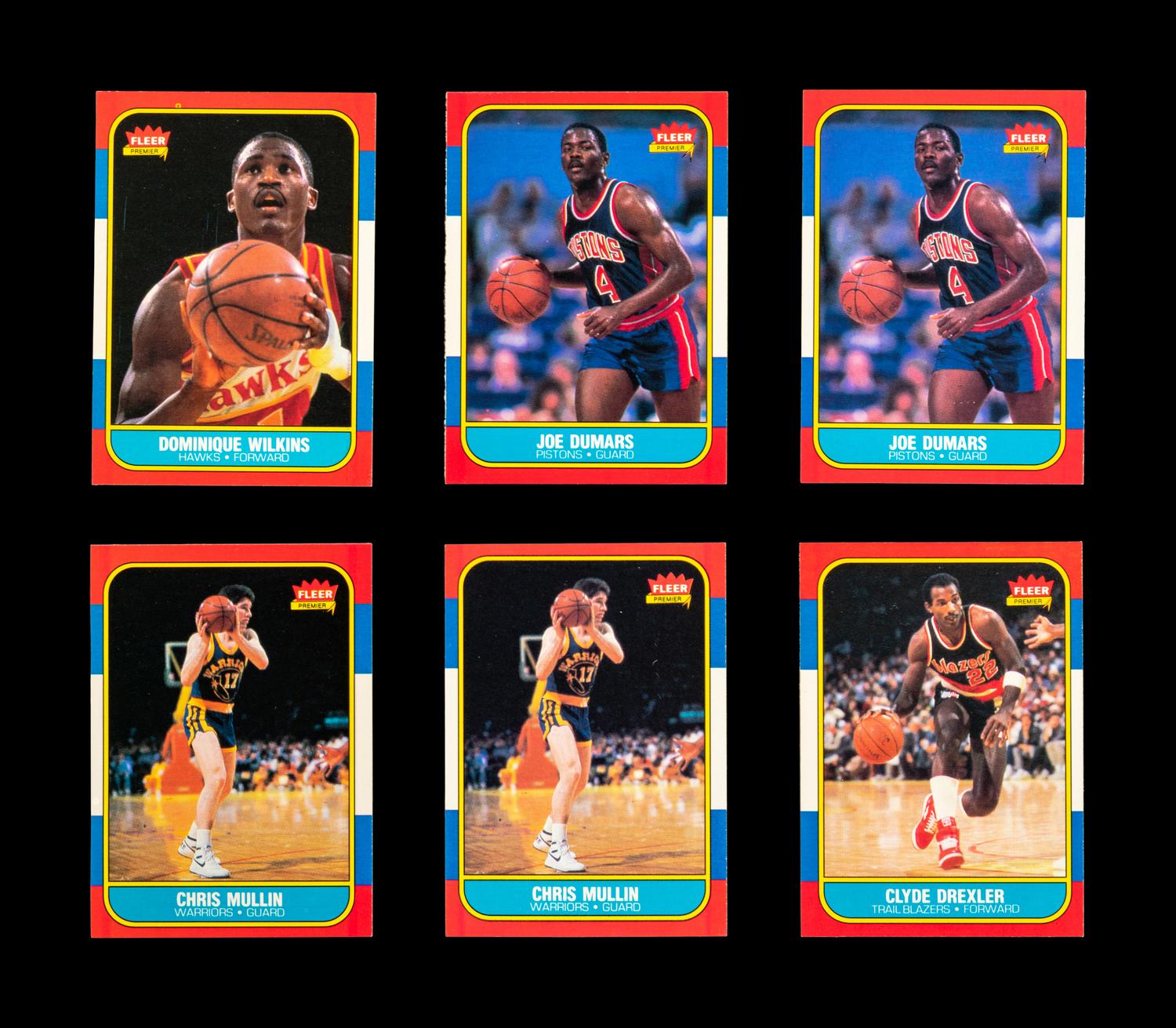 A Group of Six 1986 Fleer Rookie Basketball Cards (Including Clyde Drexler, Joe Dumars, Chris Mullin, Dominique Wilkins),