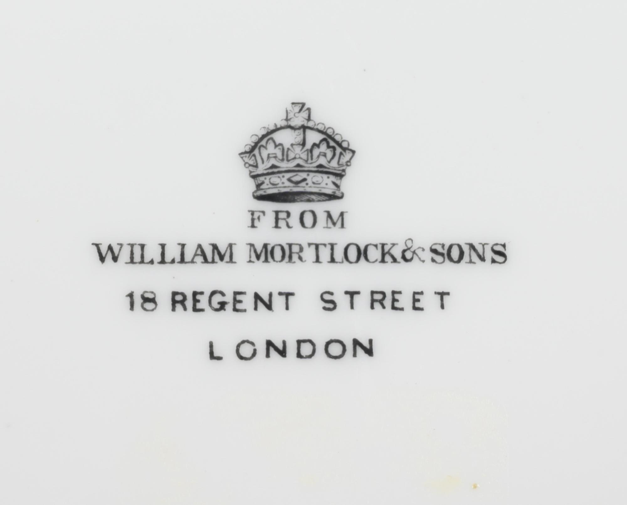 A Set of Fifteen William Mortlock & Sons Porcelain Dinner Plates