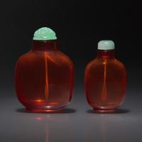 Two Chinese Amber Snuff Bottles, Qing Dynasty, 18th Century — 清中期 琥珀鼻煙壺兩支