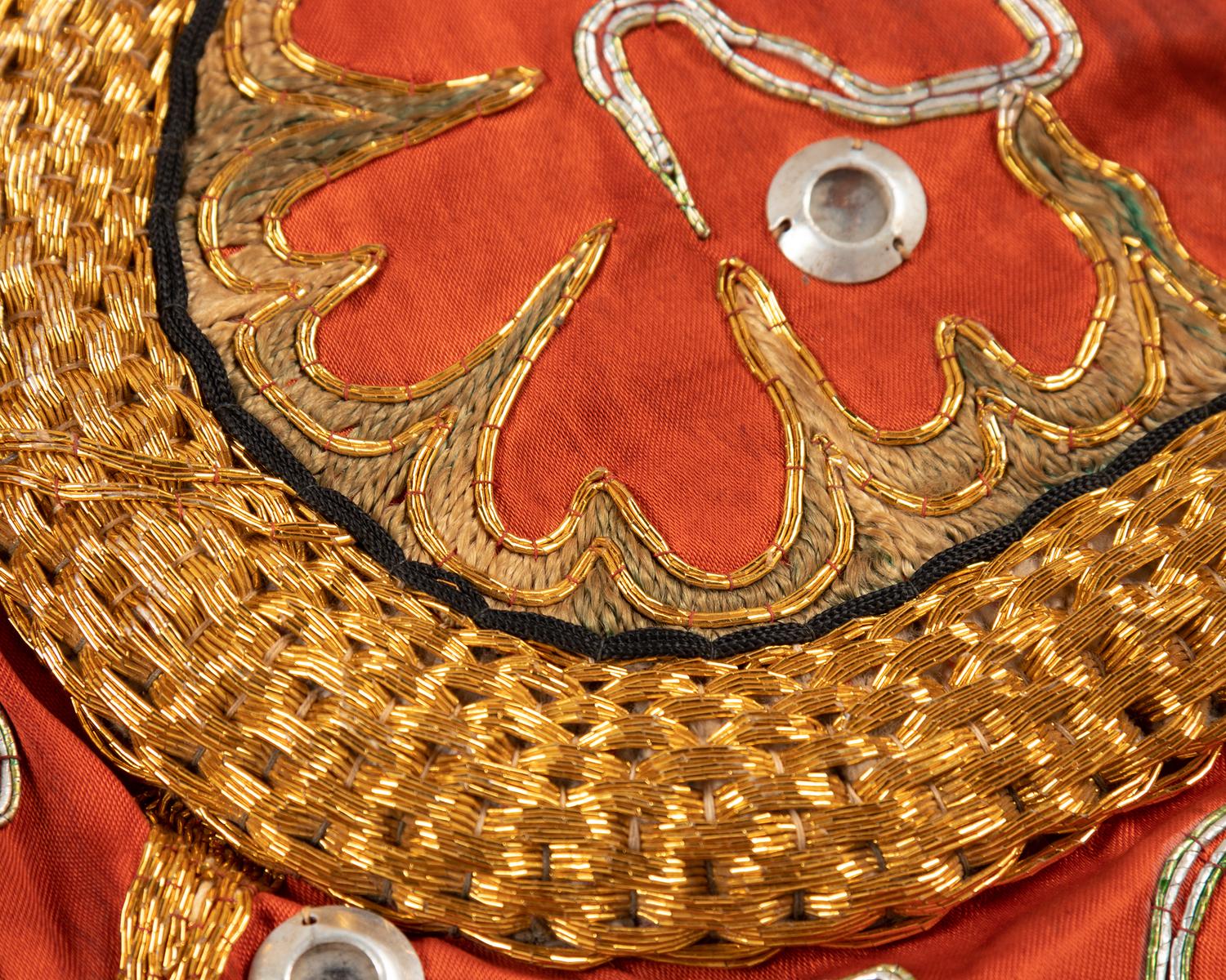 Four Chinese Orange Ground Embroidered Silk Theatrical Articles
