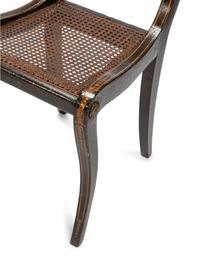 A Set of Six Regency Stencil Decorated and Parcel Gilt Ebonized Dining Chairs