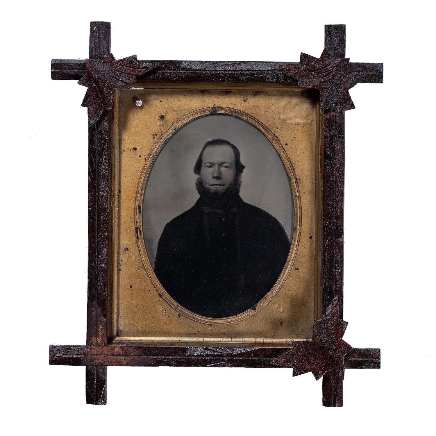 [EARLY PHOTOGRAPHY - PORTRAITURE]. A group of 11 framed portraits featuring male and female subjects highlighted by full plate tintype by Jacobs of New Orleans, including: