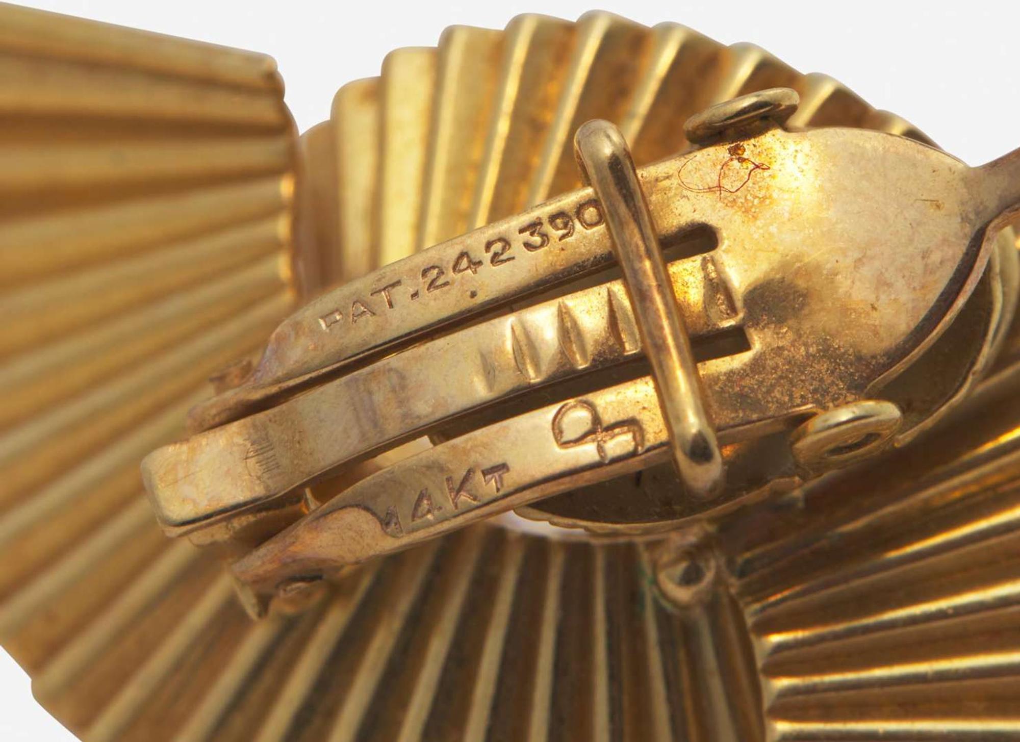 A Collection of Yellow Gold Earrings