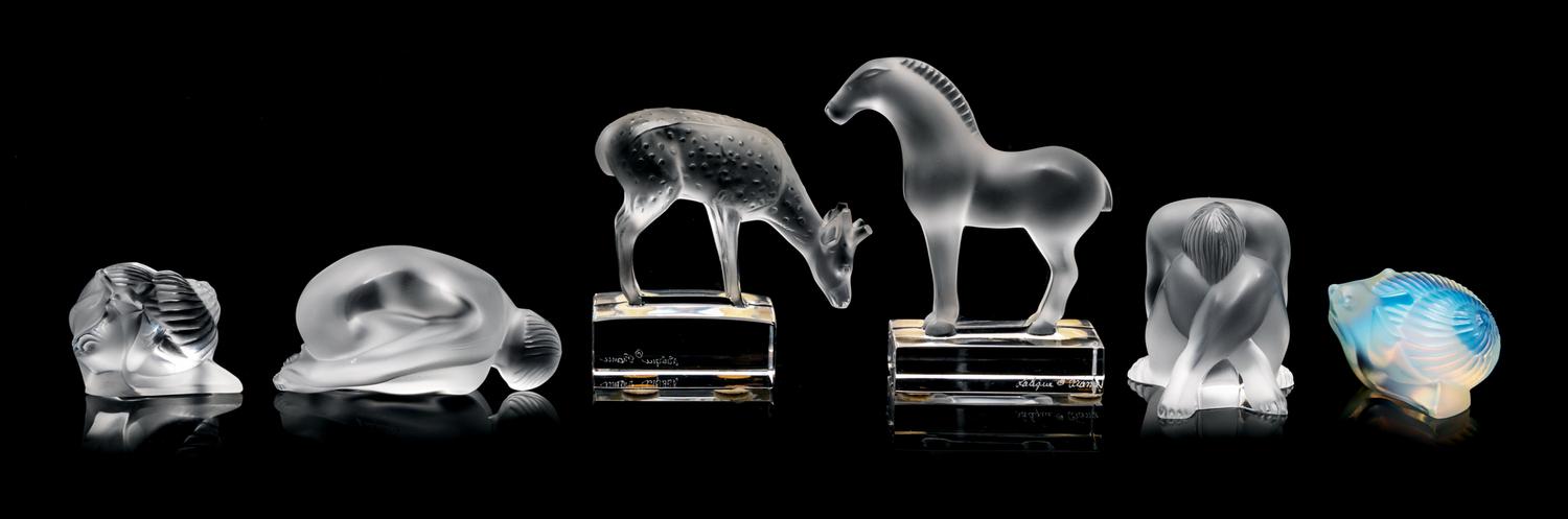 A Group of Lalique Small Ornaments Width of first 3 1/2 inches.