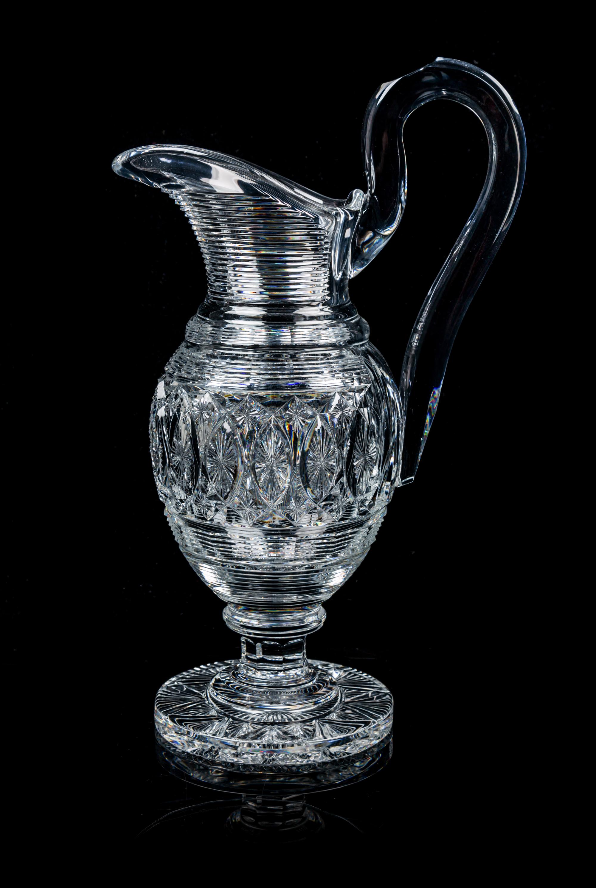A Baccarat Water Pitcher Height 13 7/8 inches.