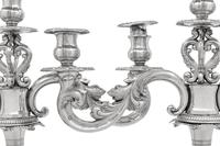 A Pair of Continental Silver Three-Light Candelabra